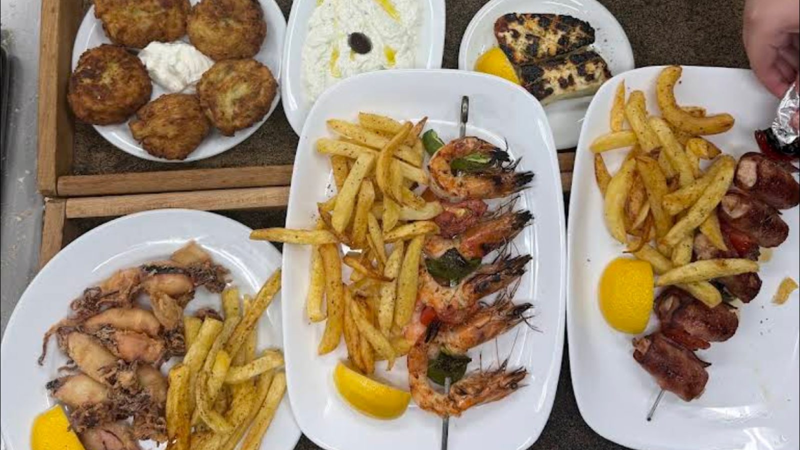 Supper ashore: grilled prawns, squid and saganaki