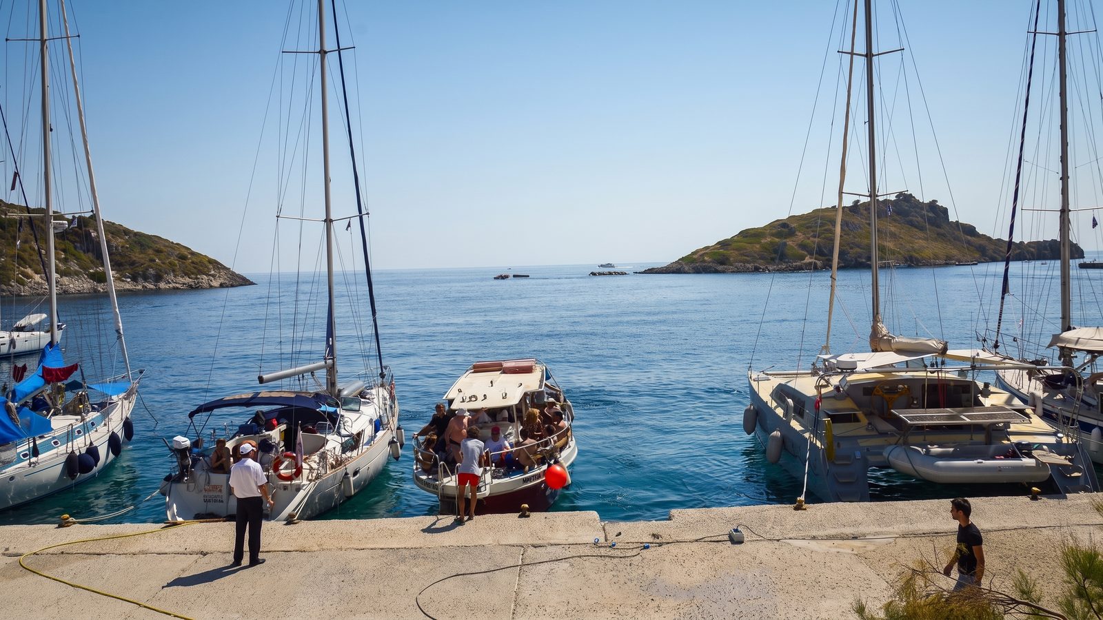 Yachts stern-to on the quay at Agios Nikolaos, Zakynthos