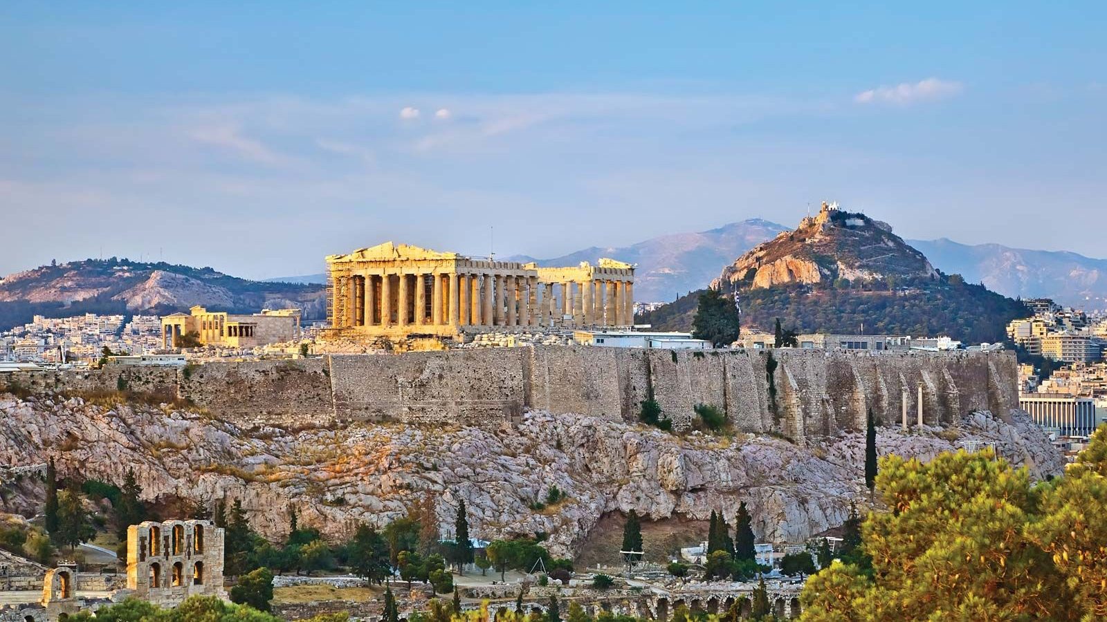 The Acropolis and the Parthenon at sunset over Athens